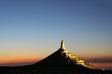 Chimney Rock National Historic Site illuminated at night, western Nebraska, USA