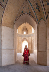 beautiful young iranian lady in a mosque