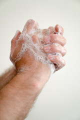 Fototapeta premium close up of man washing his hands