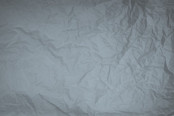 old crumpled plain wrapping paper texture background