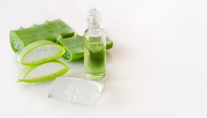 Aloe vera extract and pieces on a light background. Organic Cosmetics
