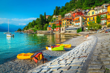 Spectacular cityscape and harbor with kayaks, canoes and boats, Italy