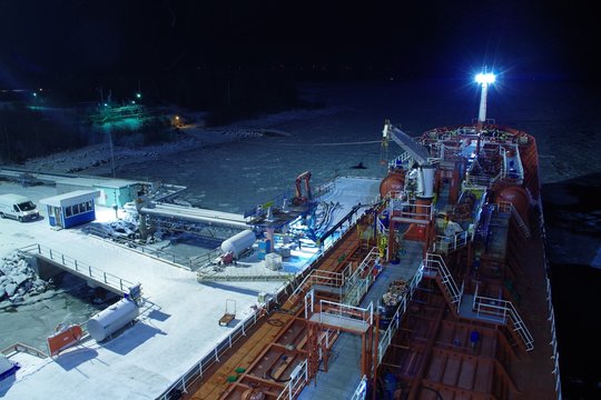 Chemical tanker at terminal in Pitea during nightime