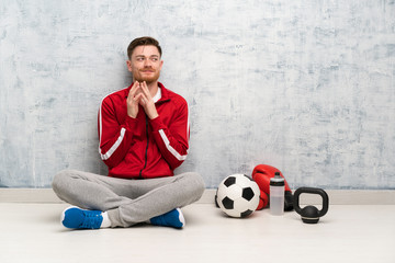 Redhead sport man scheming something