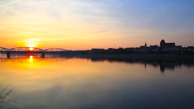 Amazing sunset over Vistula river in Torun, Poland