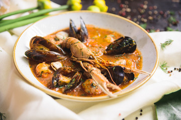 langoustine with shrimp and mussels in gravy