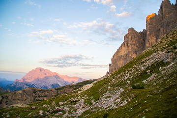Beautiful panorama view of Cappella degli Alpini chapel in Tre Cime di lavaredo National Park. Idyllic sunrise landscape scene in Dolomites, Tirol Alps, Italy