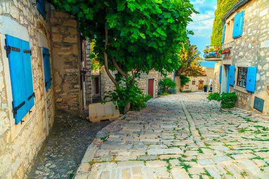 Fototapeta Beautiful old town street with stone houses, Rovinj, Istria, Croatia