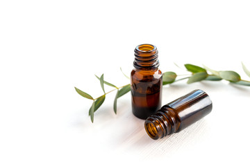 Dark glass bottles with essential oil. Natural remedy.