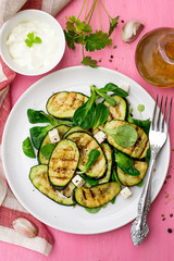 Grilled zucchini courgette with feta cheese and garlic