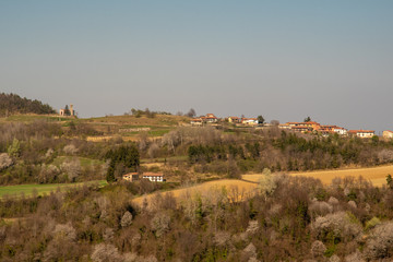 Scenic view of the hills of the Langhe region, become Unesco World Heritage Site in 2014, in springtime, Bossolasco, Piedmont, Italy 