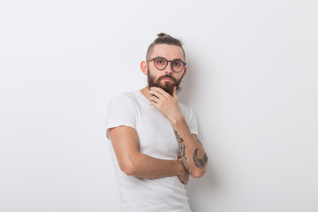 hipster, people concept - hipster guy wearing glasses with arms crossed on a white background