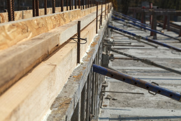 Construction of a new building, binding of reinforcement