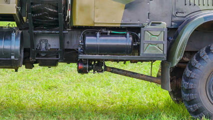 19619_View_under_the_military_truck_in_the_grass_lawn_in_Valga_Estonia.jpg