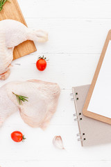 Fresh raw chicken legs with herbs. Cooking concept