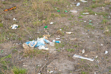 trash lies on the ground. pollution of the planet. ecology problem