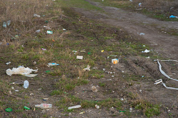 trash lies on the ground. pollution of the planet. ecology problem