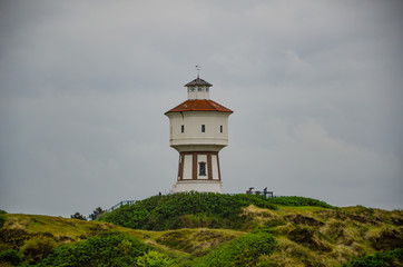 Fototapeta na wymiar Lighthouse upon the hills