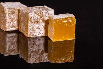 Turkish delight or rahat lokum. East sweet which can be used as a background