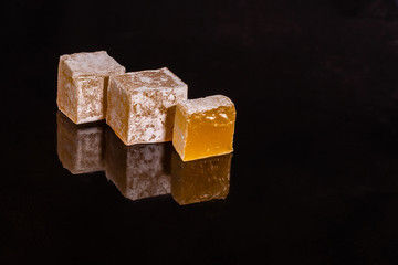 Turkish delight or rahat lokum. East sweet which can be used as a background