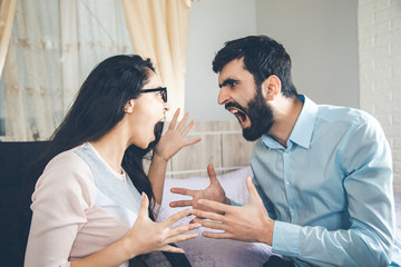 angry woman with man in home