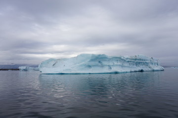 Fototapeta na wymiar Jokulsarlon with big ice rocks insummer on Iceland
