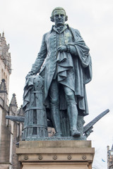 Fototapeta na wymiar Adam Smith statue on Royal Mile Statue Edinburgh Scotland