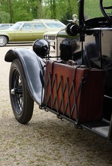 vintage leather case at oldtimer car