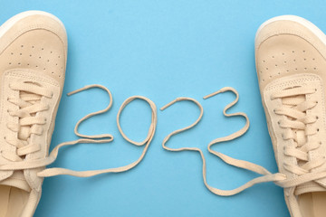 New women sneakers with laces in 2023 text.