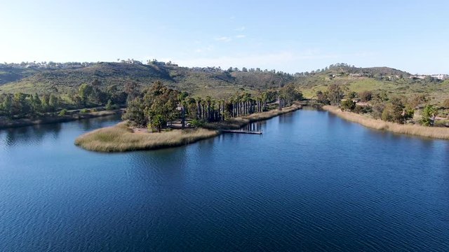 Aerial view of Miramar reservoir in the Scripps Miramar Ranch community, San Diego, California. Miramar lake, popular activities recreation site including boating, fishing, picnic & 5-mile-long trail.