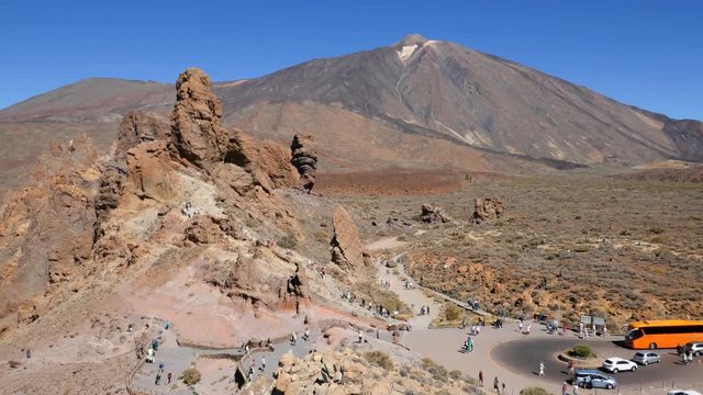 Time lapse of people hiking on Los Roques de Garcia rocks near the Teide volcano, Teide National Park, Tenerife, Canary islands, Spain.