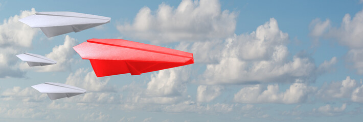A group of white paper air planes heading in one direction lead by red individual paper plane as a...