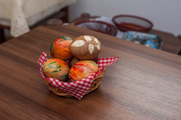 Beautiful colorful Easter eggs on wooden table. Protein source