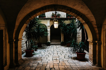 Fototapeta na wymiar Bari, Italy - March 12, 2019: Interior atrium of a typical dwelling in Italian renancentist style.