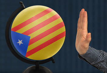 gesture of a male hand warns against the globe, which depicts a colored national state flag...