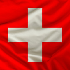 the color flag of the state of Switzerland depicted on textiles with soft folds