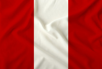 national flag of peru on silk fabric with soft folds, background