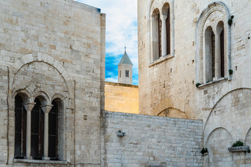 Fototapeta na wymiar Stone walls of the medieval cathedral of San Nicolas di Bari.