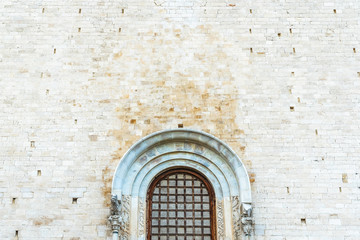 Stone walls of the medieval cathedral of San Nicolas di Bari.