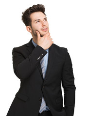 Young smiling man looking up. Isolated on white