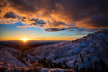Sunset over snowy foothills near Boise Idaho