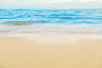 Fototapeta na wymiar White sand and blue sea, beautiful sky