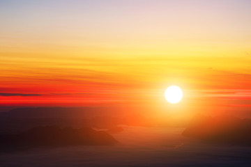 Beautiful sunrise with High mountain.Foggy white.Soft picture