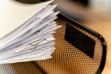 Stack of paper document in office In tray at work