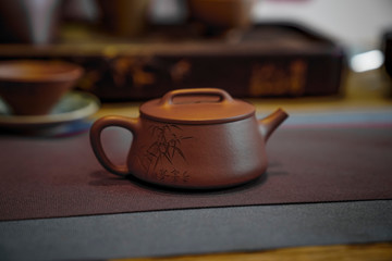 the red enameled pottery teapot