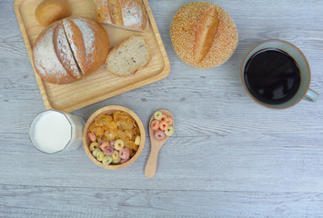 Fototapeta na wymiar Breakfast table with cereals, coffee and White bread