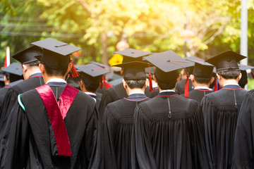 Obraz premium Back side view student graduation of graduates during commencement. Congratulation in University concept, Education concept.