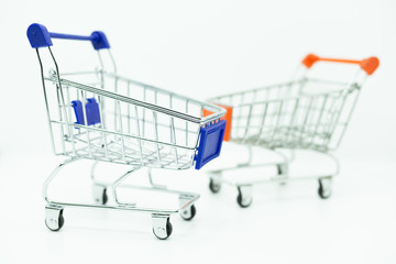Shopping carts on white background with copy space. Shopping concept