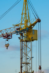 building crane over clear blue sky background