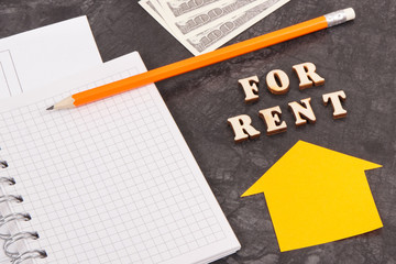 Dollar, notepad for notes and electrical diagrams, renting house or flat concept